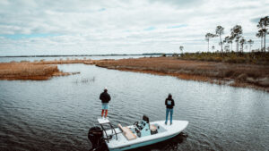 2 men fishing, careers, best flats boat